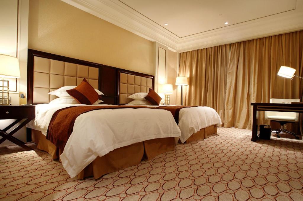 Landison Green Town Hotel Xinchang Quarto foto